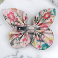 An elegant Rose Garden Floral Medium Cotton Butterfly Bow by Tuhil Threads, measuring approximately 12cm wide by 8cm high. Shop Tuhil Threads hair accessories.