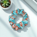 Aqua Bloom Peach PolyCotton Scrunchie. Shop Tuhil Threads hair accessories. Aqua Bloom Peach PolyCotton Scrunchie. Shop Tuhil Threads hair accessories.