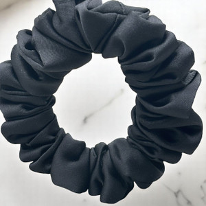 Tuhil Threads Small Black Royal Micro Satin Scrunchie. Luxurious small satin hair tie for a gentle, stylish hold. Shop Tuhil Threads hair accessories Tuhil Threads Small Black Royal Micro Satin Scrunchie. Luxurious small satin hair tie for a gentle, stylish hold. Shop Tuhil Threads hair accessories