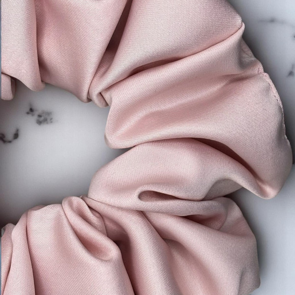 Tuhil Threads Large Soft Pink Royal Micro Satin Scrunchie. Luxurious large satin hair tie for a gentle, stylish hold. Shop Tuhil Threads hair accessories.