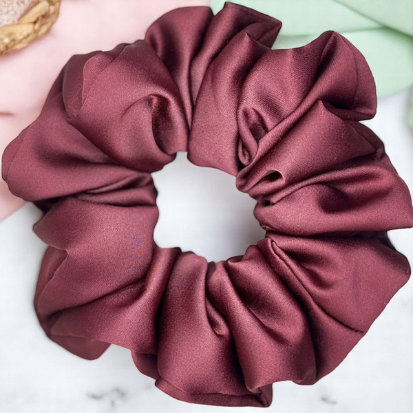 Tuhil Threads Large Burgundy Royal Micro Satin Scrunchie. Luxurious large satin hair tie for a gentle, stylish hold. Shop Tuhil Threads hair accessories.