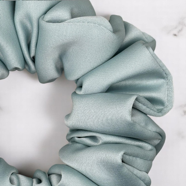 Tuhil Threads Medium Mint Green Royal Micro Satin Scrunchie. Luxurious medium satin hair tie for a gentle, stylish hold. Shop Tuhil Threads hair accessories.