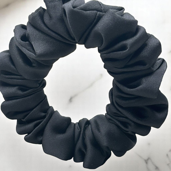 Tuhil Threads Small Black Royal Micro Satin Scrunchie. Luxurious small satin hair tie for a gentle, stylish hold. Shop Tuhil Threads hair accessories