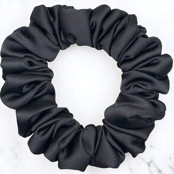 Tuhil Threads Small Black Royal Micro Satin Scrunchie. Luxurious small satin hair tie for a gentle, stylish hold. Shop Tuhil Threads hair accessories