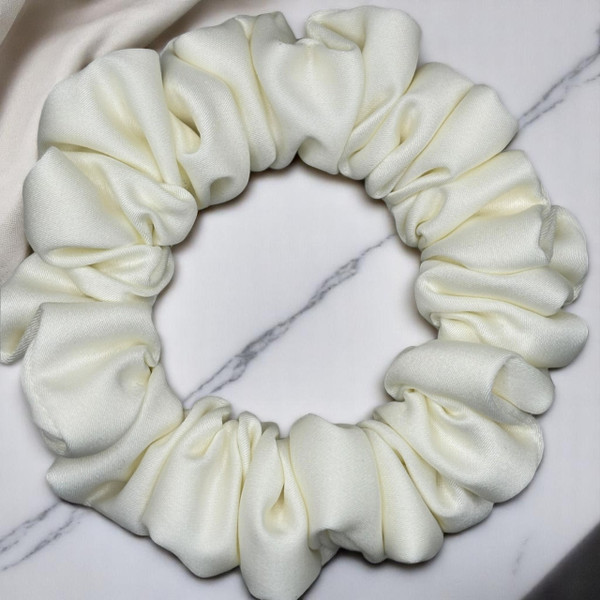 Tuhil Threads Small Cream Royal Micro Satin Scrunchie. Luxurious small satin hair tie for a gentle, stylish hold. Shop Tuhil Threads hair accessories
