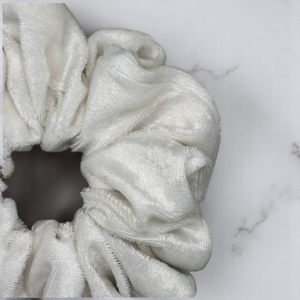 Tuhil Threads Large Ivory Velvet Scrunchie. Soft, rich large velvet hair tie for an elegant, gentle hold. Shop Tuhil Threads hair accessories.