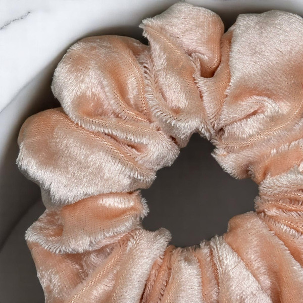 Tuhil Threads Large Peach Velvet Scrunchie. Soft, rich large velvet hair tie for an elegant, gentle hold. Shop Tuhil Threads hair accessories.