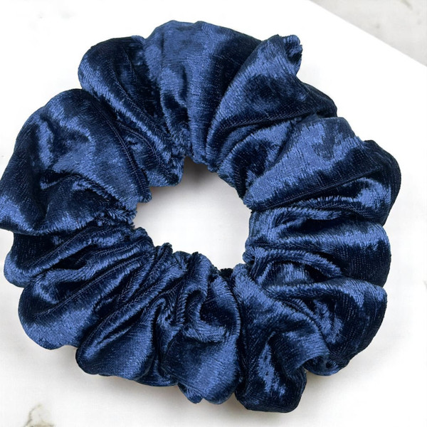 Tuhil Threads Large French Navy Velvet Scrunchie. Soft, rich large velvet hair tie for an elegant, gentle hold. Shop Tuhil Threads hair accessories.