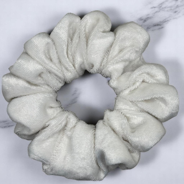 Tuhil Threads Medium Ivory Velvet Scrunchie. Soft, rich medium velvet hair tie for an elegant, gentle hold. Shop Tuhil Threads hair accessories.