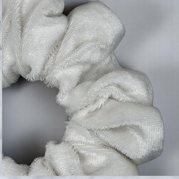 Tuhil Threads Medium Ivory Velvet Scrunchie. Soft, rich medium velvet hair tie for an elegant, gentle hold. Shop Tuhil Threads hair accessories.