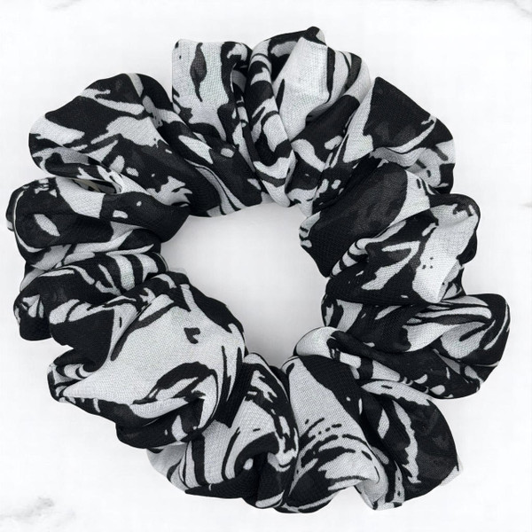 Tuhil Threads Medium Black and White Abstract Print Chiffon Scrunchie. Lightweight Medium chiffon hair tie with a bold monochrome design for a stylish, gentle hold. Shop Tuhil Threads hair accessories