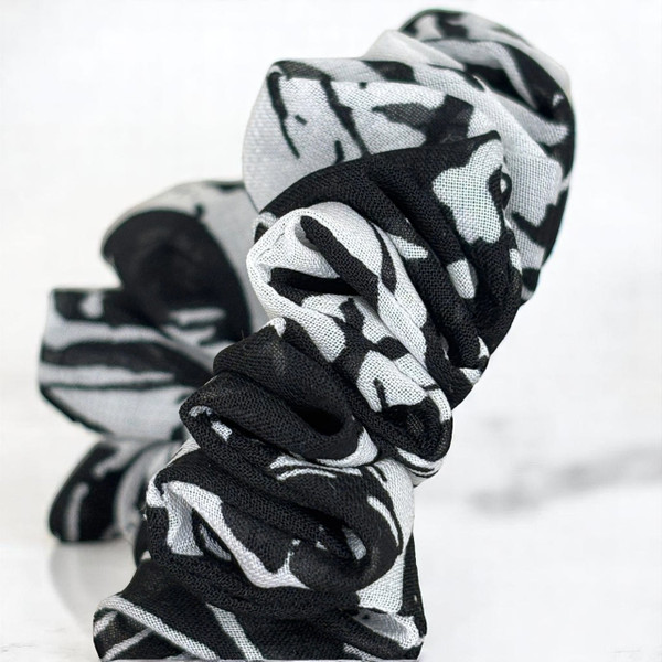Tuhil Threads Small Black and White Abstract Print Chiffon Scrunchie. Lightweight Small chiffon hair tie with a bold monochrome design for a stylish, gentle hold. Shop Tuhil Threads hair accessories