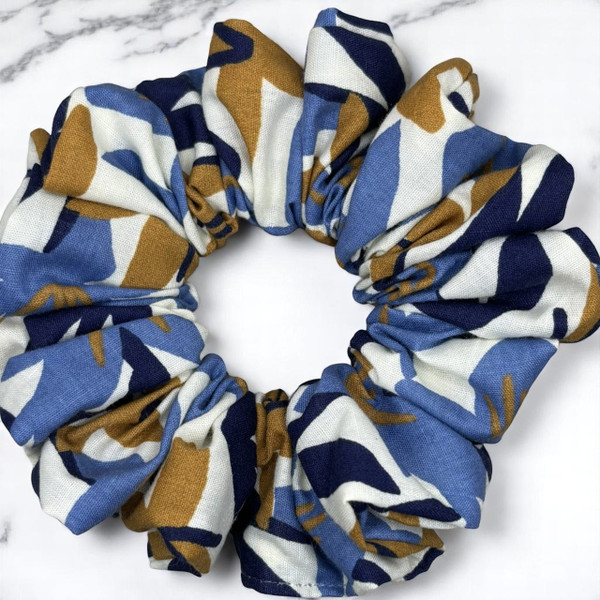 Tuhil Threads Medium Blue & Ochre Abstract Print Polycotton Scrunchie. Shop Tuhil Threads hair accessories.