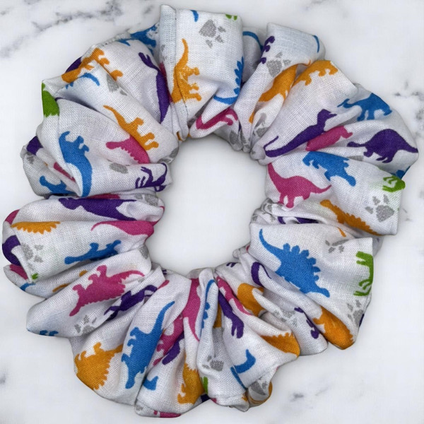 Tuhil Threads Medium White & Rainbow Dinosaur Print Polycotton Scrunchie.Shop Tuhil Threads hair accessories.