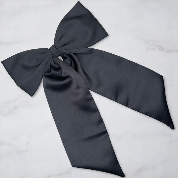 Tuhil Threads Black Royal Micro Satin Statement Long Tail Bow. Luxurious satin hair bow for an elegant, stylish accent. Shop Tuhil Threads hair accessories.
