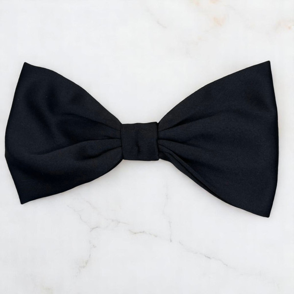 Tuhil Threads Large Black Royal Micro Satin Classic Bow, front view, showcasing its sleek finish and statement size. Shop Tuhil Threads hair accessories.