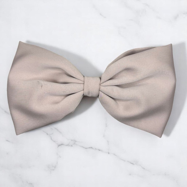Tuhil Threads Large Mink Royal Micro Satin Classic Bow, front view, showcasing its smooth texture and rich warm grey-brown statement size. Shop Tuhil Threads hair accessories.