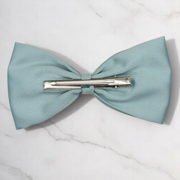Tuhil Threads Large Mint Green Royal Micro Satin Classic Bow, front view, showcasing its smooth texture and refreshing pastel statement size. Shop Tuhil Threads hair accessories.