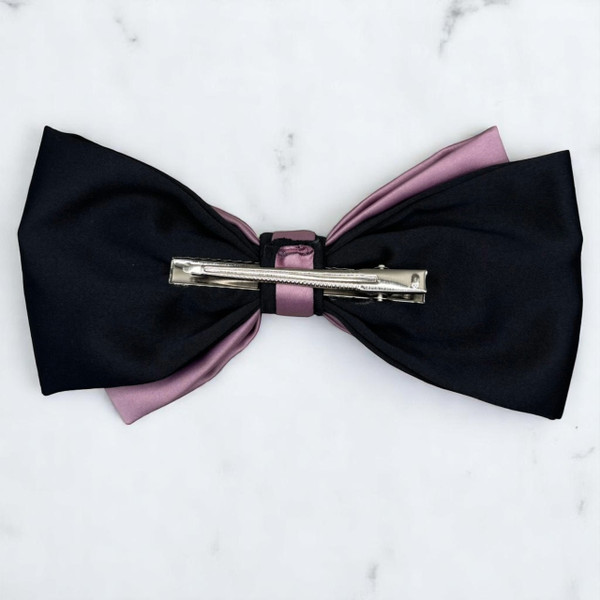 Tuhil Threads Large Royal Micro Satin Classic Bow in a two-tone design with a bold black bottom layer and a soft lilac top layer, neatly tied, measuring 17x10cm. Shop Tuhil Threads hair accessories.