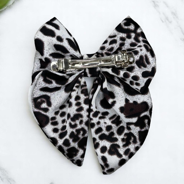 A stylish Spotted Black and Grey Style Medium Silky Satin Pigtail Bow by Tuhil Threads, measuring 10cm x 12cm. Shop Tuhil Threads hair accessories. A stylish Spotted Black and Grey Style Medium Silky Satin Pigtail Bow by Tuhil Threads, measuring 10cm x 12cm. Shop Tuhil Threads hair accessories.