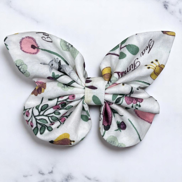 A charming Whimsical Tea Party Medium Cotton Butterfly Bow by Tuhil Threads, measuring approximately 12cm wide by 8cm high. Shop Tuhil Threads hair accessories.