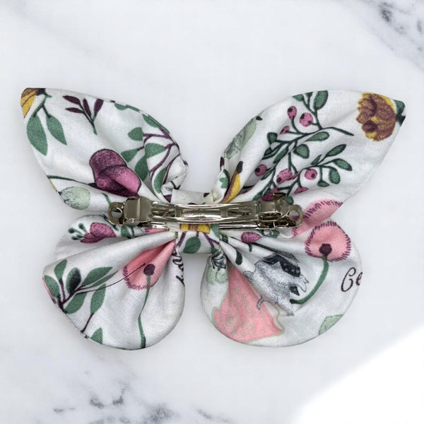 A charming Whimsical Tea Party Medium Cotton Butterfly Bow by Tuhil Threads, measuring approximately 12cm wide by 8cm high. Shop Tuhil Threads hair accessories.