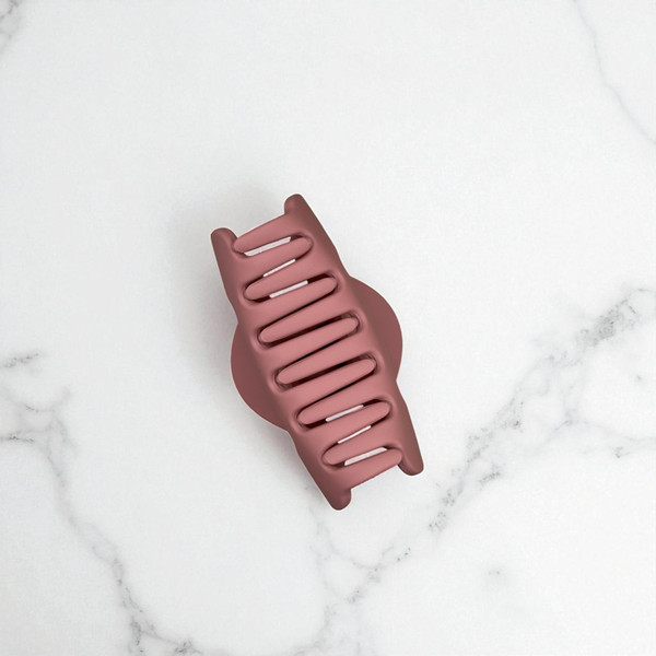 Mini terracotta rectangle hair claw clip, 4cm long, top view. Mini terracotta rectangle hair claw clip, 4cm long, top view.