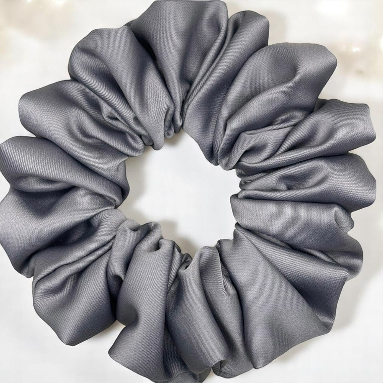 Tuhil Threads Medium Grey Royal Micro Satin Scrunchie. Luxurious medium satin hair tie for a gentle, stylish hold. Shop Tuhil Threads hair accessories.