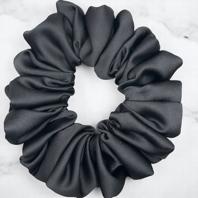 Tuhil Threads Medium Black Royal Micro Satin Scrunchie. Luxurious medium satin hair tie for a gentle, stylish hold. Shop Tuhil Threads hair accessories.