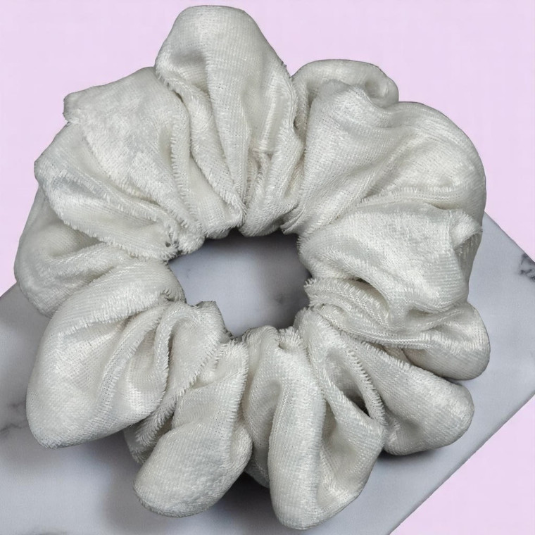 Tuhil Threads Large Ivory Velvet Scrunchie. Soft, rich large velvet hair tie for an elegant, gentle hold. Shop Tuhil Threads hair accessories.