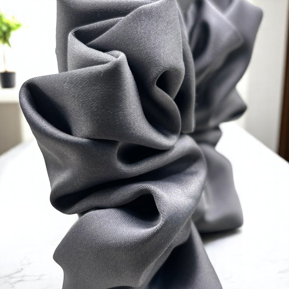 Tuhil Threads Large Grey Royal Micro Satin Scrunchie. Luxurious large satin hair tie for a gentle, stylish hold. Shop Tuhil Threads hair accessories.