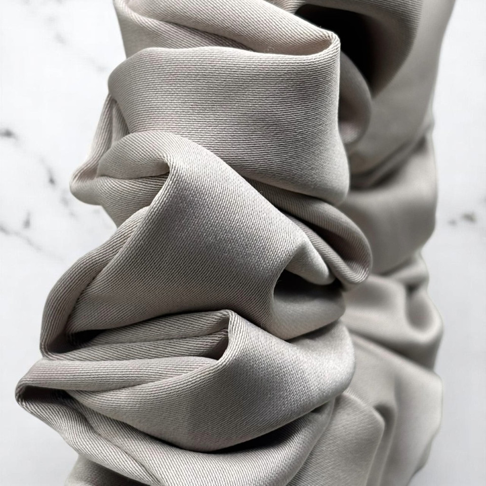 Tuhil Threads Large Mink Royal Micro Satin Scrunchie. Luxurious large satin hair tie for a gentle, stylish hold. Shop Tuhil Threads hair accessories.