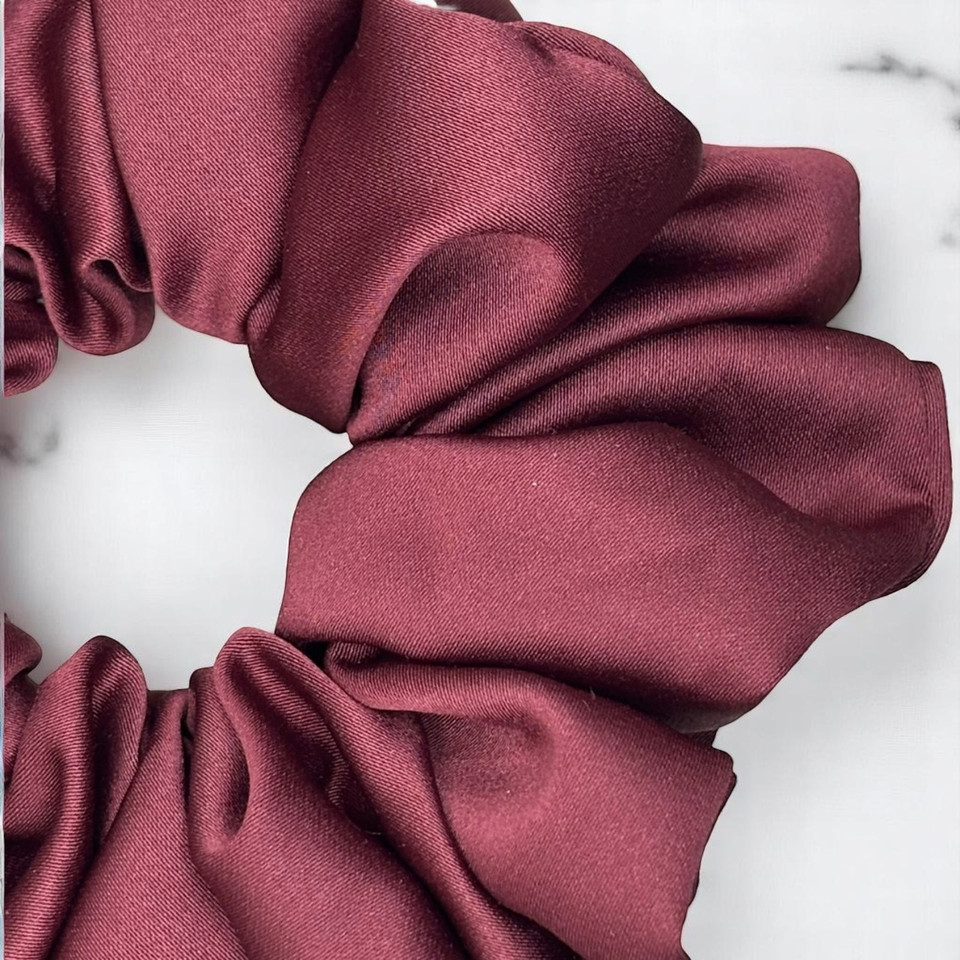 Tuhil Threads Large Burgundy Royal Micro Satin Scrunchie. Luxurious large satin hair tie for a gentle, stylish hold. Shop Tuhil Threads hair accessories.