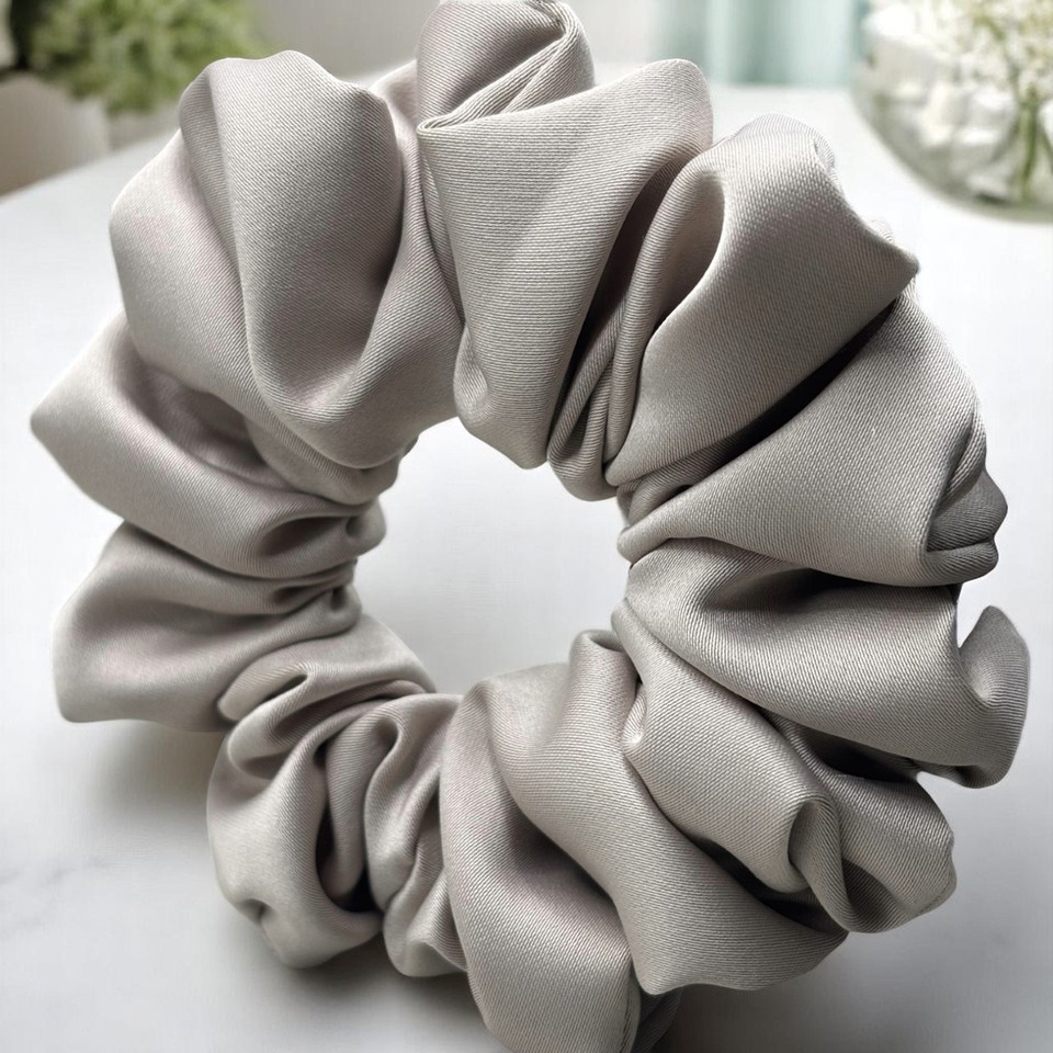 Tuhil Threads Medium Mink Royal Micro Satin Scrunchie. Luxurious medium satin hair tie for a gentle, stylish hold. Shop Tuhil Threads hair accessories.