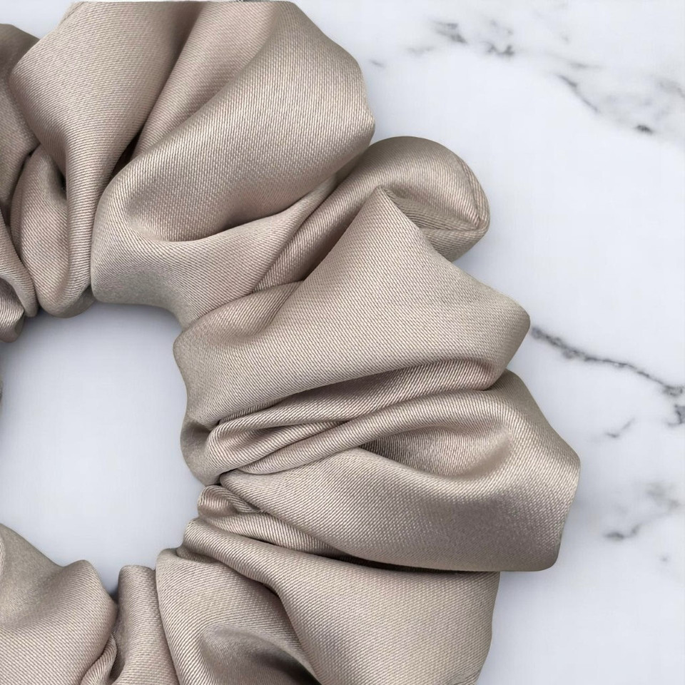Tuhil Threads Medium Mink Royal Micro Satin Scrunchie. Luxurious medium satin hair tie for a gentle, stylish hold. Shop Tuhil Threads hair accessories.