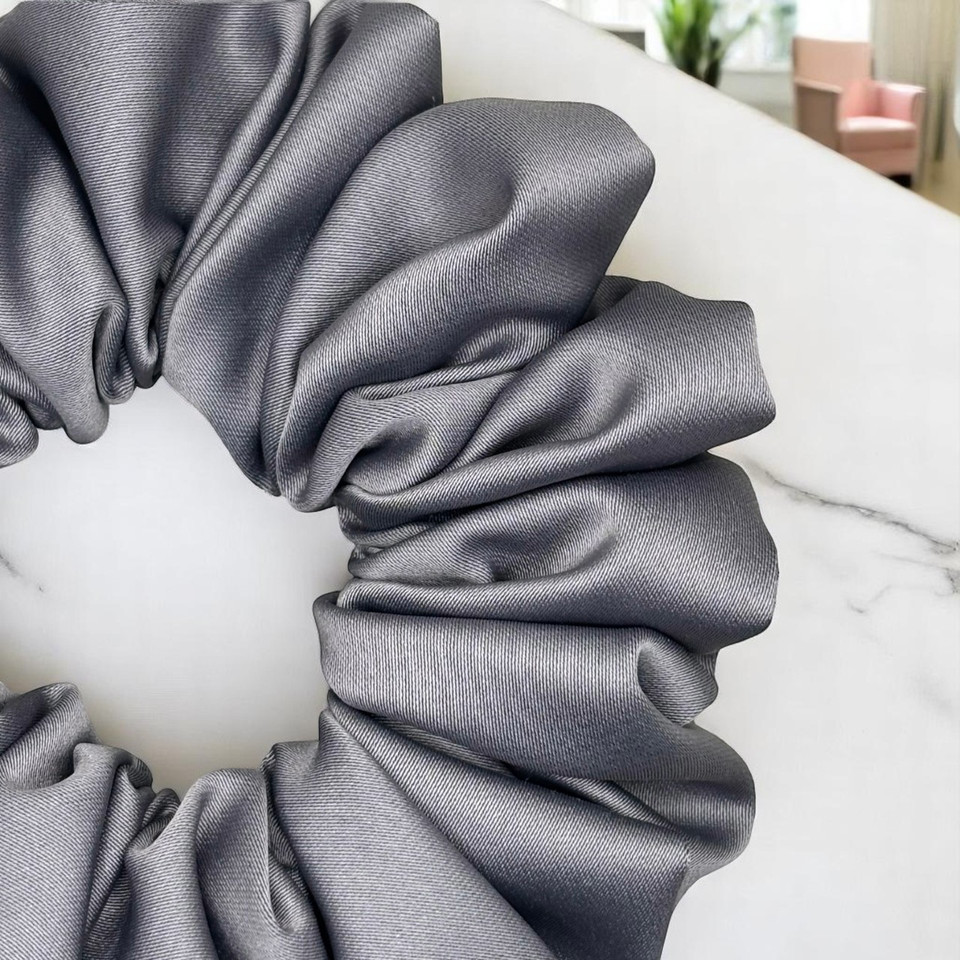 Tuhil Threads Medium Grey Royal Micro Satin Scrunchie. Luxurious medium satin hair tie for a gentle, stylish hold. Shop Tuhil Threads hair accessories.