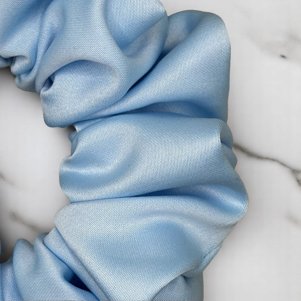 Tuhil Threads Medium Sky Blue Royal Micro Satin Scrunchie. Luxurious medium satin hair tie for a gentle, stylish hold. Shop Tuhil Threads hair accessories.