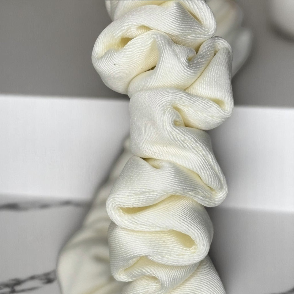 Tuhil Threads X-Small Cream Royal Micro Satin Scrunchie. Luxurious extra small satin hair tie for a gentle, stylish hold. Shop Tuhil Threads hair accessories