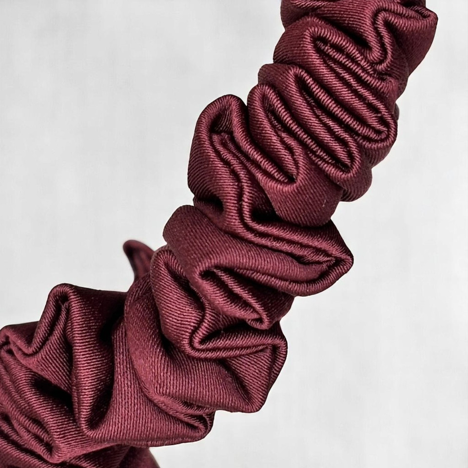 Tuhil Threads X-Small Burgundy Royal Micro Satin Scrunchie. Luxurious extra small satin hair tie for a gentle, stylish hold. Shop Tuhil Threads hair accessories
