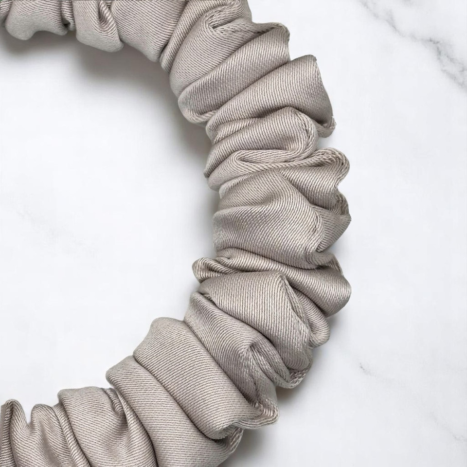 Tuhil Threads X-Small Mink Royal Micro Satin Scrunchie. Luxurious extra small satin hair tie for a gentle, stylish hold. Shop Tuhil Threads hair accessories