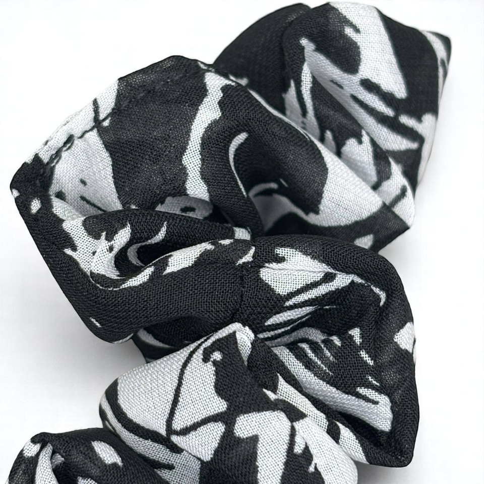 Tuhil Threads Medium Black and White Abstract Print Chiffon Scrunchie. Lightweight Medium chiffon hair tie with a bold monochrome design for a stylish, gentle hold. Shop Tuhil Threads hair accessories