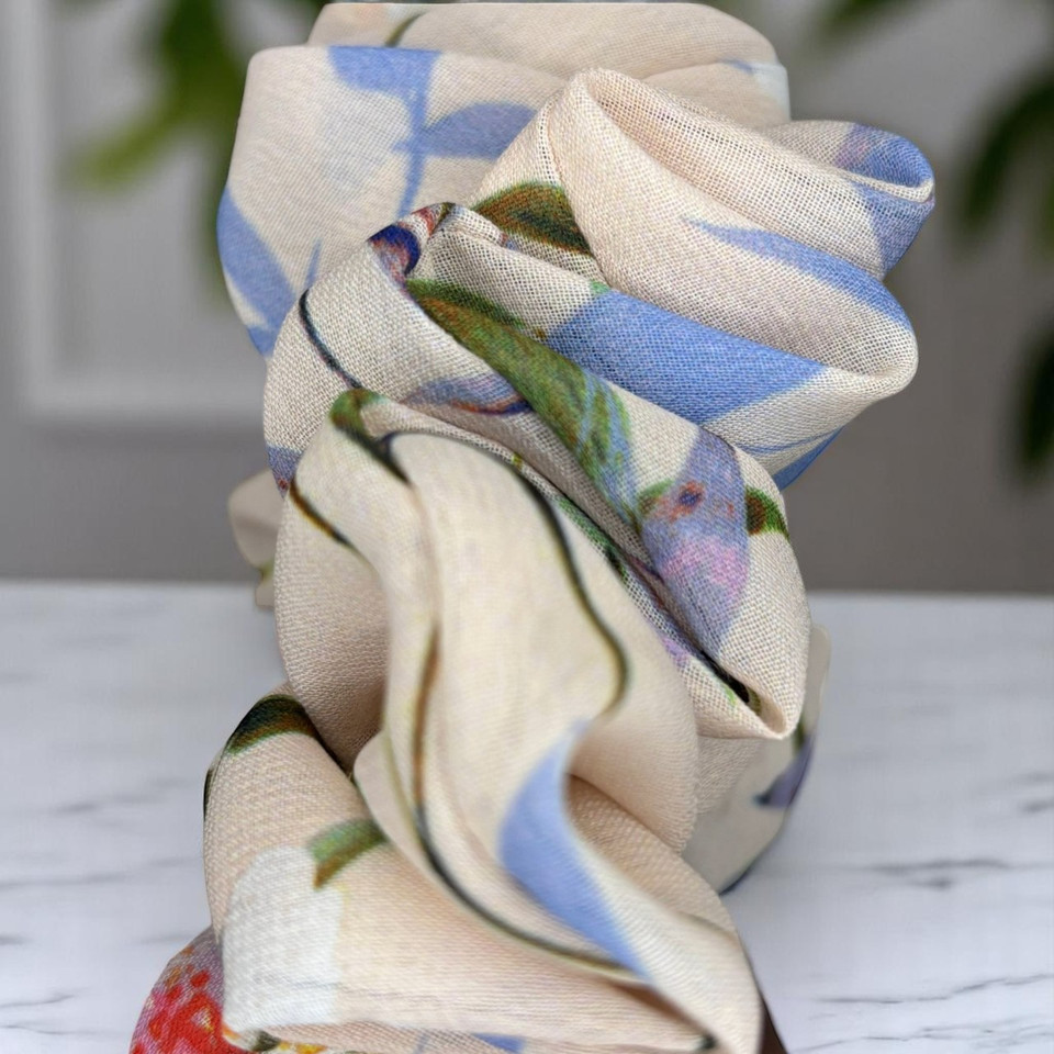Tuhil Threads Large Floral Print Scrunchie. Charming large hair tie with a beautiful multi-colour floral design, offering a stylish and gentle hold. Shop Tuhil Threads hair accessories.