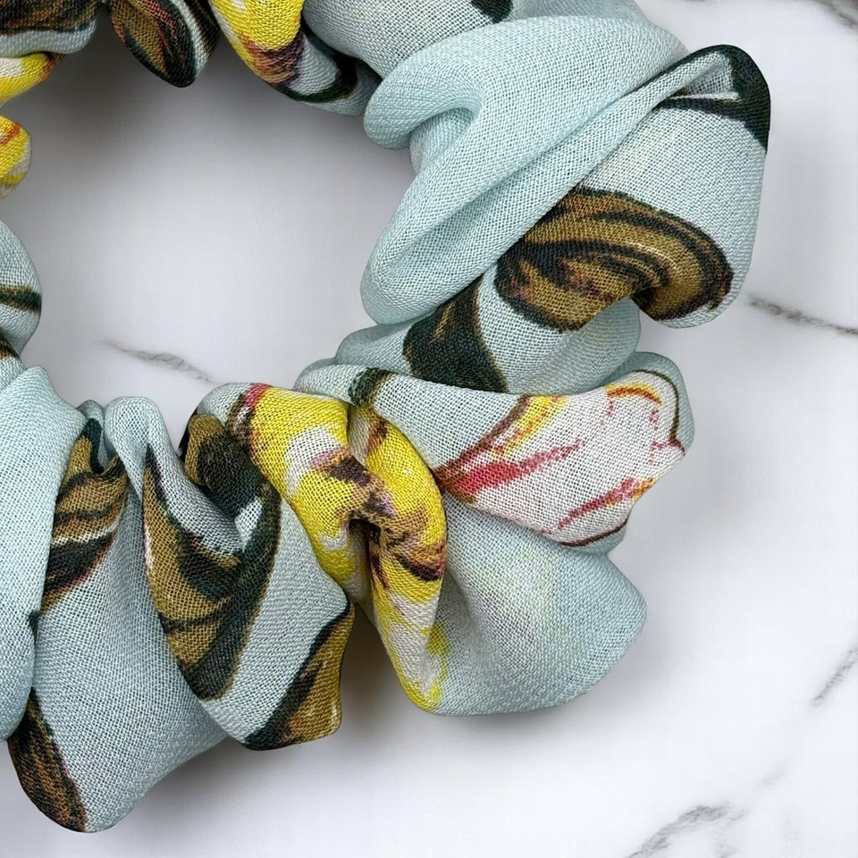 Tuhil Threads Medium Sky Blue Artistic Floral Print Chiffon Scrunchie. Shop Tuhil Threads hair accessories.