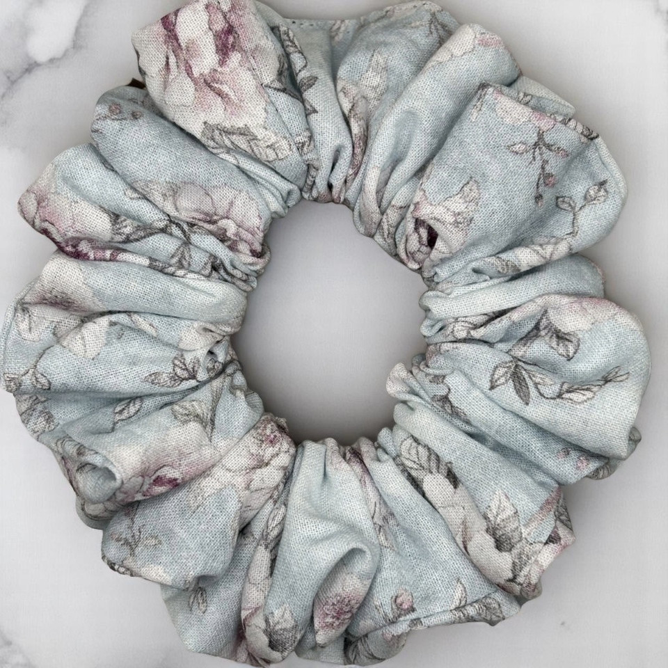 Tuhil Threads Medium Floral Print John Louden Cotton Scrunchie. Soft, breathable medium cotton hair tie made with premium John Louden fabric for comfortable everyday style and a gentle hold. Shop Tuhil Threads hair accessories.