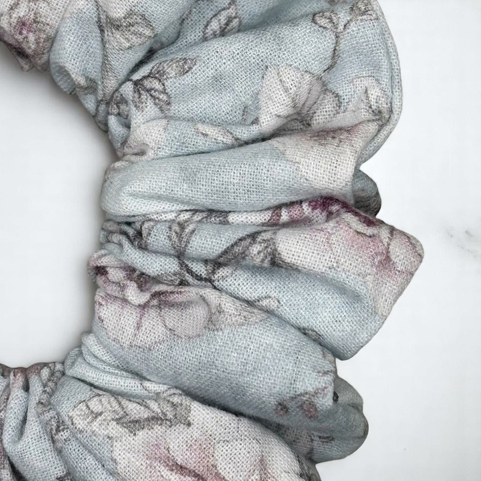 Tuhil Threads Medium Floral Print John Louden Cotton Scrunchie. Soft, breathable medium cotton hair tie made with premium John Louden fabric for comfortable everyday style and a gentle hold. Shop Tuhil Threads hair accessories.