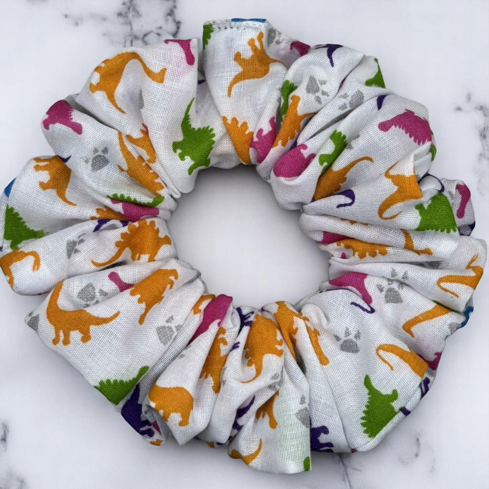 Tuhil Threads Medium White & Rainbow Dinosaur Print Polycotton Scrunchie.Shop Tuhil Threads hair accessories.