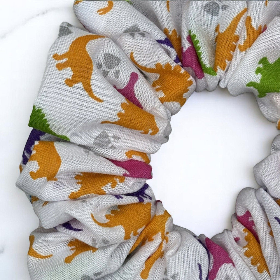 Tuhil Threads Medium White & Rainbow Dinosaur Print Polycotton Scrunchie.Shop Tuhil Threads hair accessories.