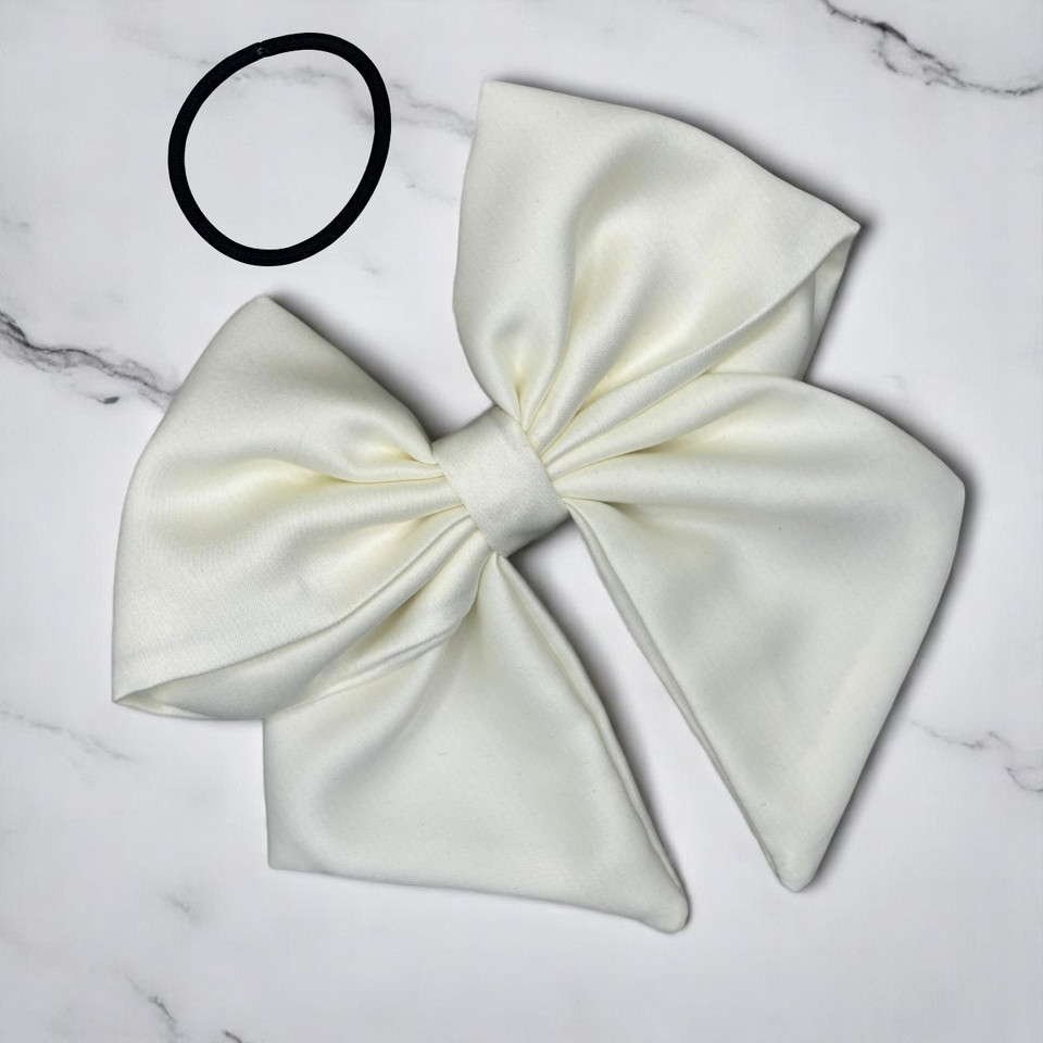 Tuhil Threads Cream Single Layer Royal Micro Satin Sailor Bow (or bow clip/bow hair tie, depending on focus). Luxurious satin hair bow for an elegant, sophisticated accent. Shop Tuhil Threads hair accessories.