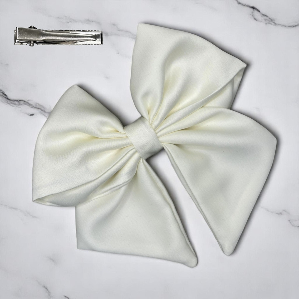 Tuhil Threads Cream Single Layer Royal Micro Satin Sailor Bow (or bow clip/bow hair tie, depending on focus). Luxurious satin hair bow for an elegant, sophisticated accent. Shop Tuhil Threads hair accessories.