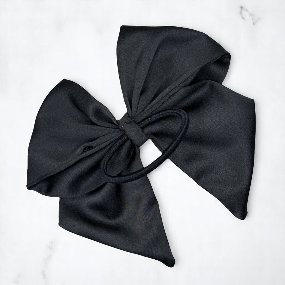 Tuhil Threads Black Single Layer Royal Micro Satin Sailor Bow (or bow clip/bow hair tie, depending on focus). Luxurious satin hair bow for an elegant, sophisticated accent. Shop Tuhil Threads hair accessories.